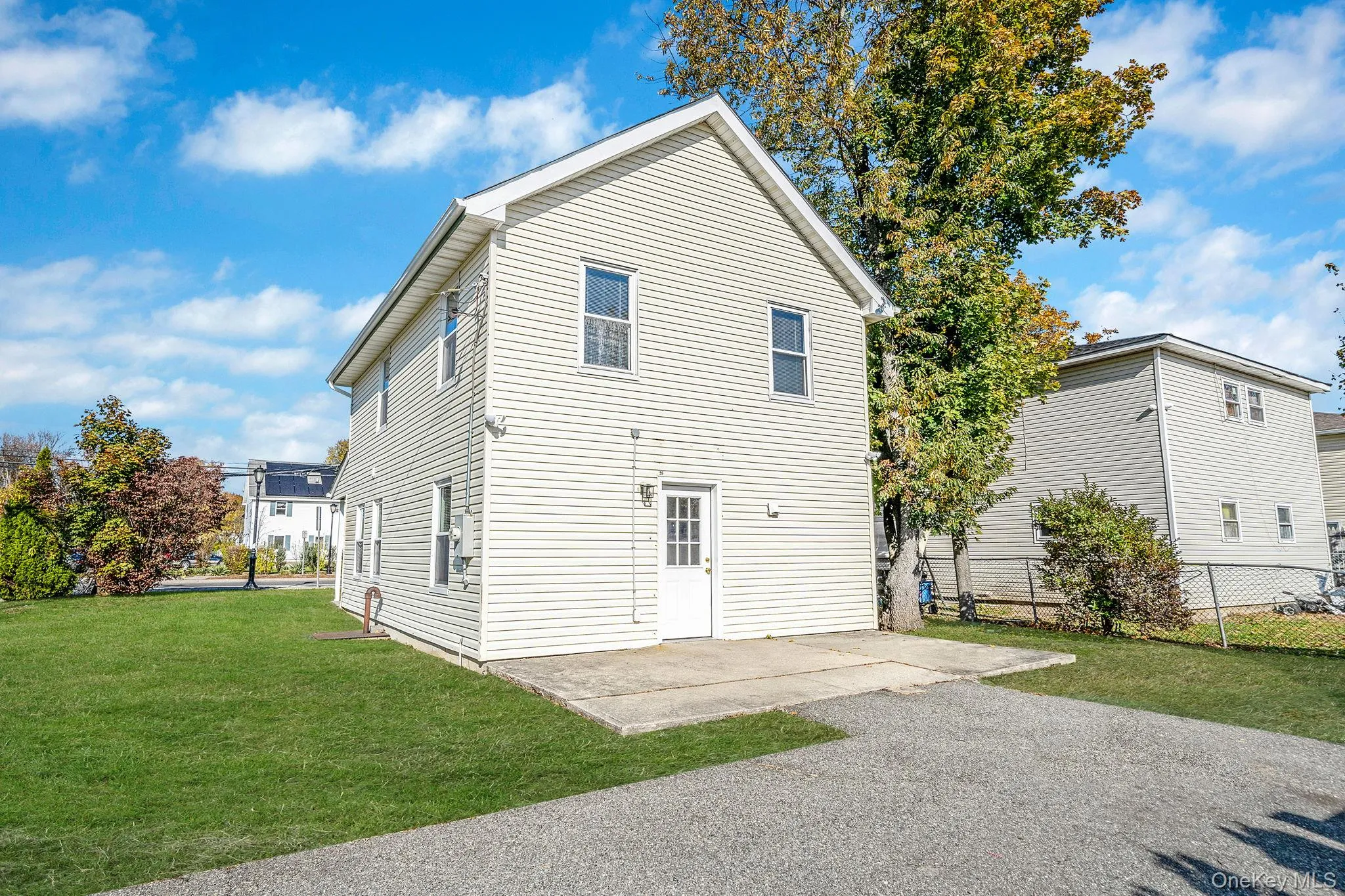 Rear view of property with a patio Rear view of property with a patio