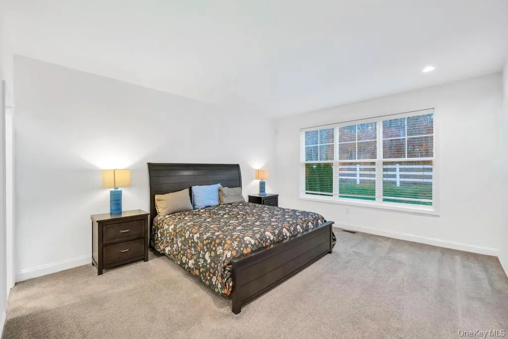 Bedroom featuring carpet flooring and recessed lighting Bedroom featuring carpet flooring and recessed lighting