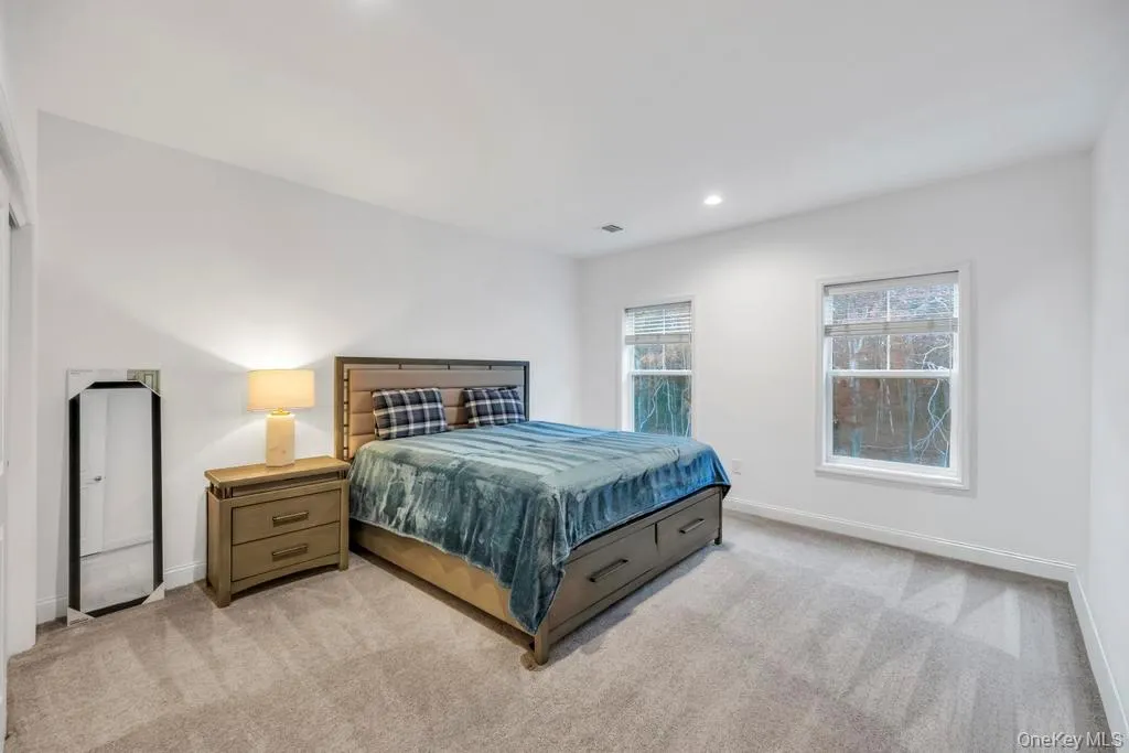 Bedroom featuring carpet floors and recessed lighting Bedroom featuring carpet floors and recessed lighting