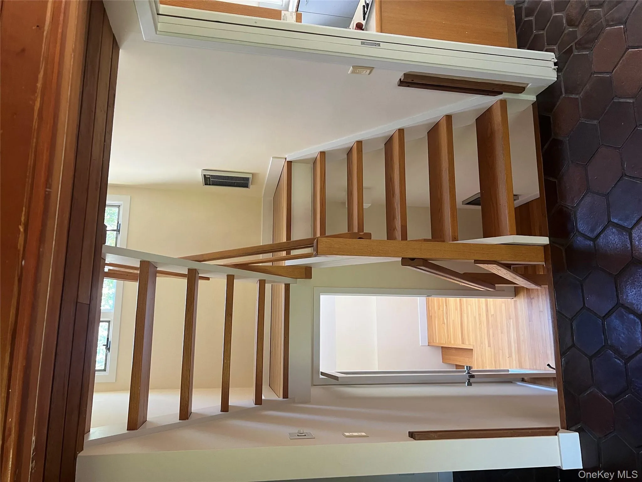 Stairway featuring baseboards Stairway featuring baseboards