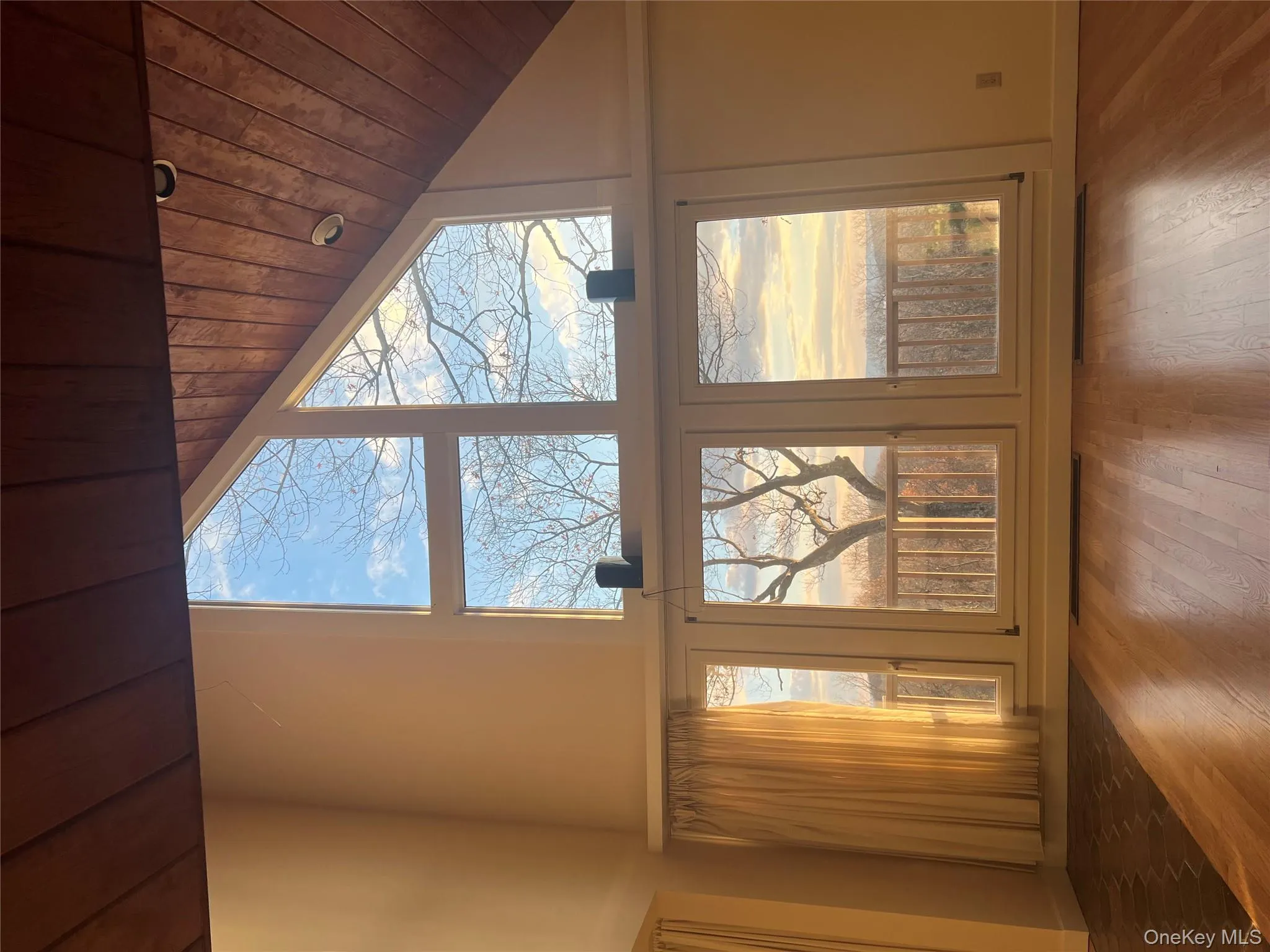 Detailed view of wood ceiling and wood finished floors Detailed view of wood ceiling and wood finished floors