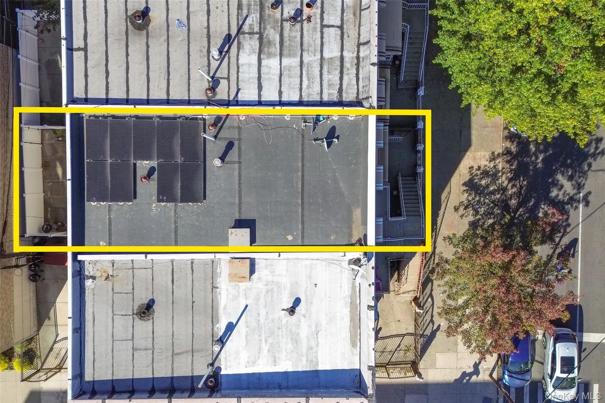 Aerial view of property and surrounding area with property parcel outlined Aerial view of property and surrounding area with property parcel outlined