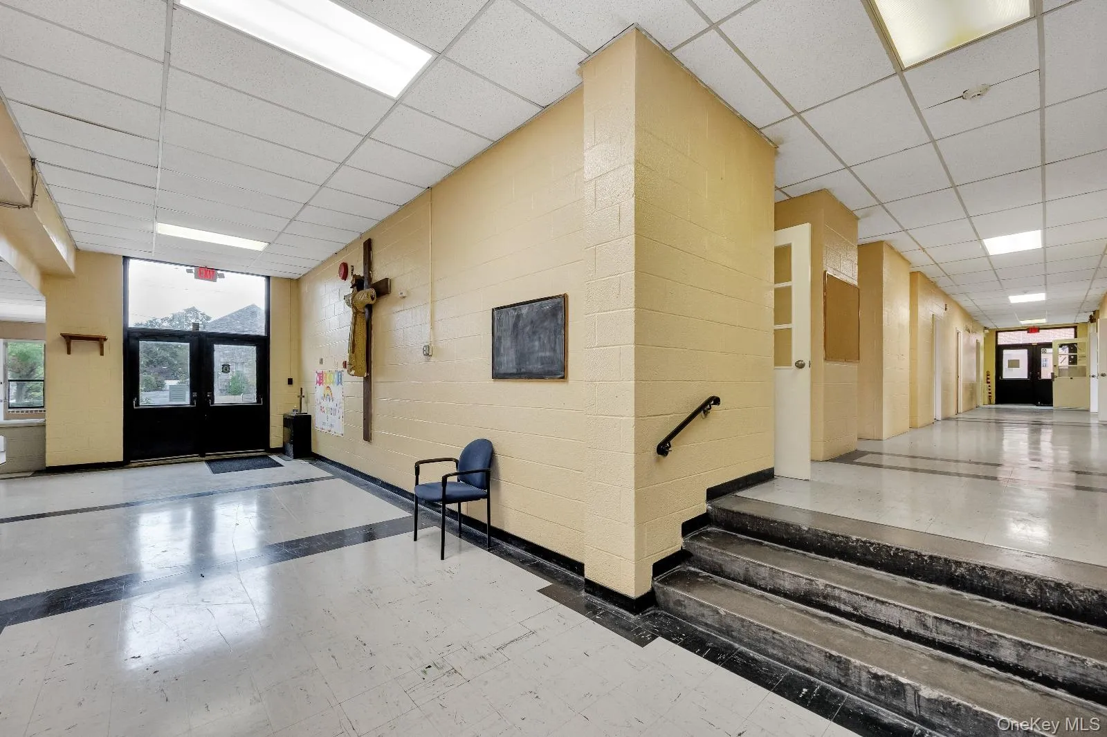 Lobby with a paneled ceiling Lobby with a paneled ceiling