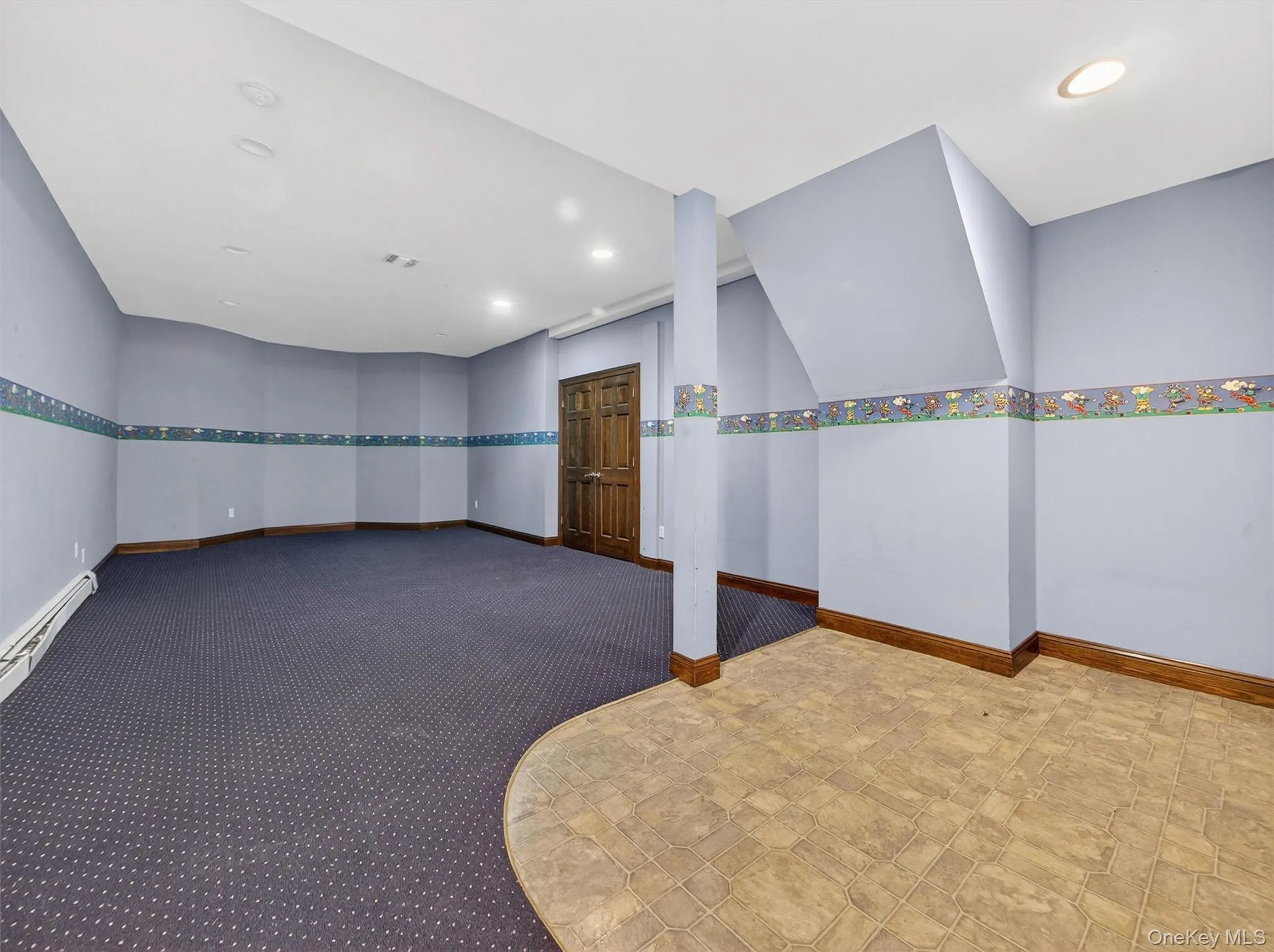 Additional living space with recessed lighting and carpet flooring Additional living space with recessed lighting and carpet flooring