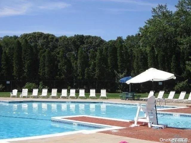 Community pool featuring a patio Community pool featuring a patio