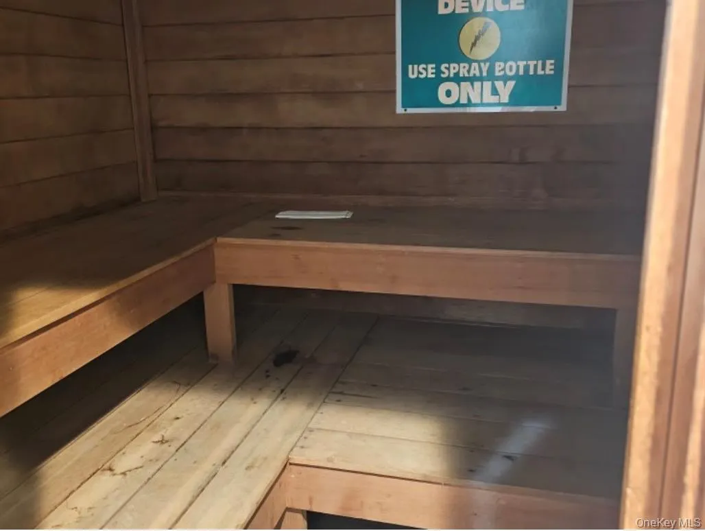 Sauna featuring wood walls Sauna featuring wood walls