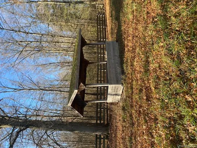 View of home's community featuring an outdoor structure View of home's community featuring an outdoor structure