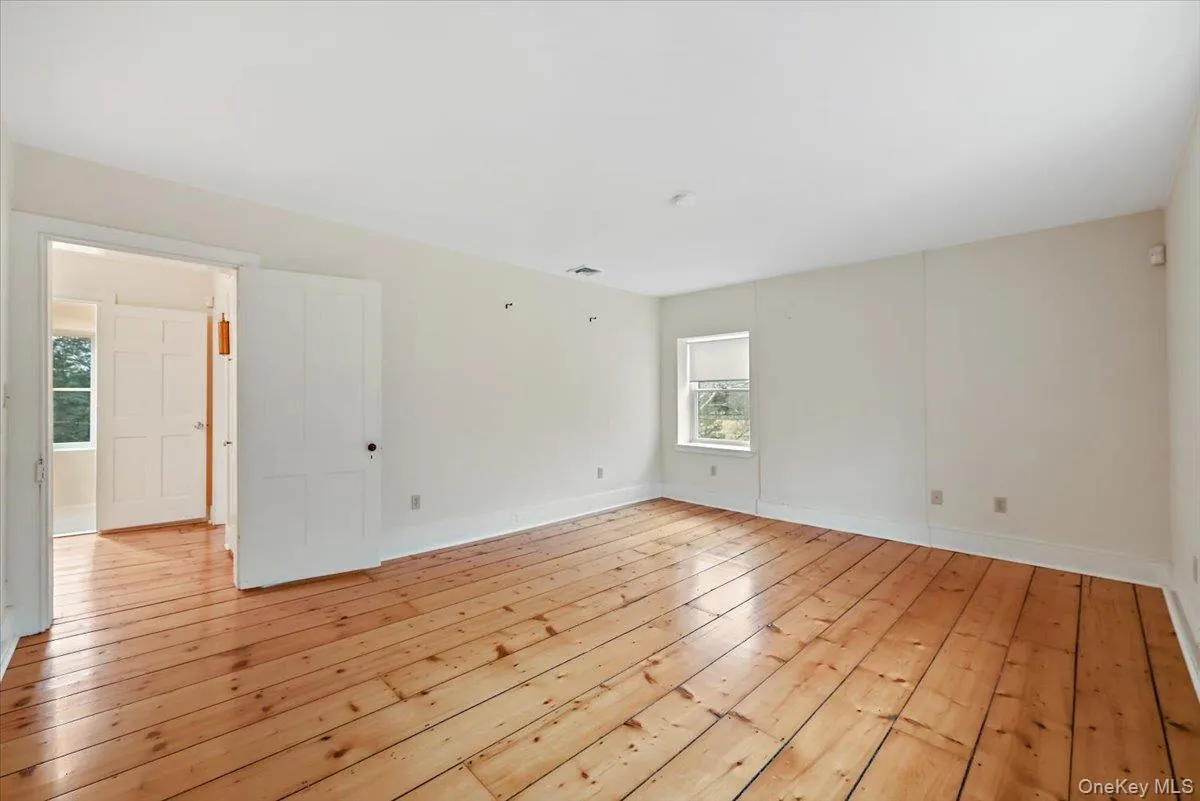 Empty room with light wood-style flooring Empty room with light wood-style flooring