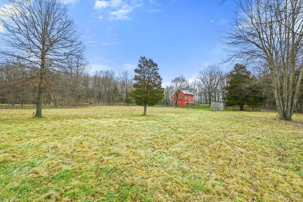 View of yard with a rural view and a barn View of yard with a rural view and a barn