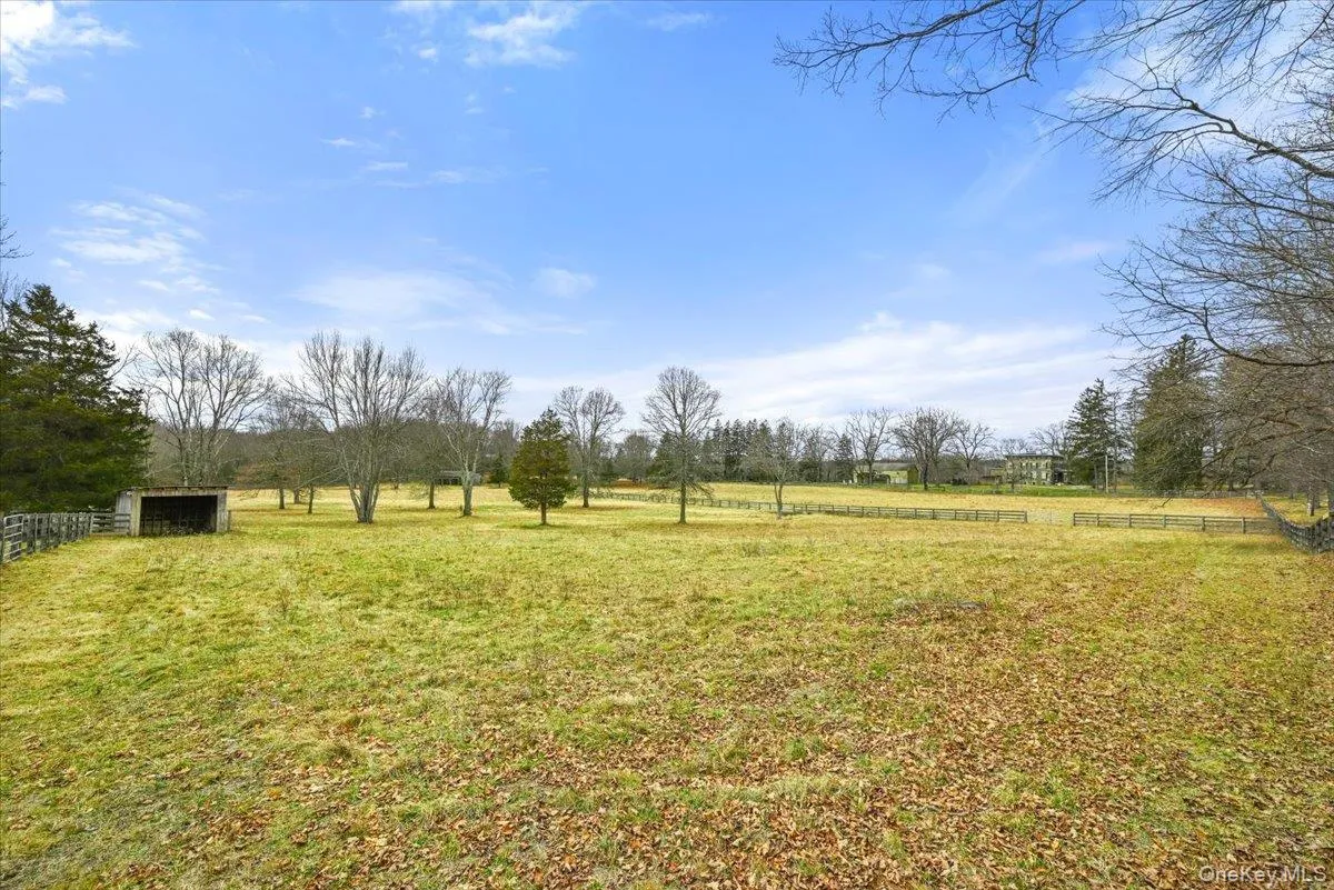 View of yard featuring a view of countryside and an outbuilding View of yard featuring a view of countryside and an outbuilding