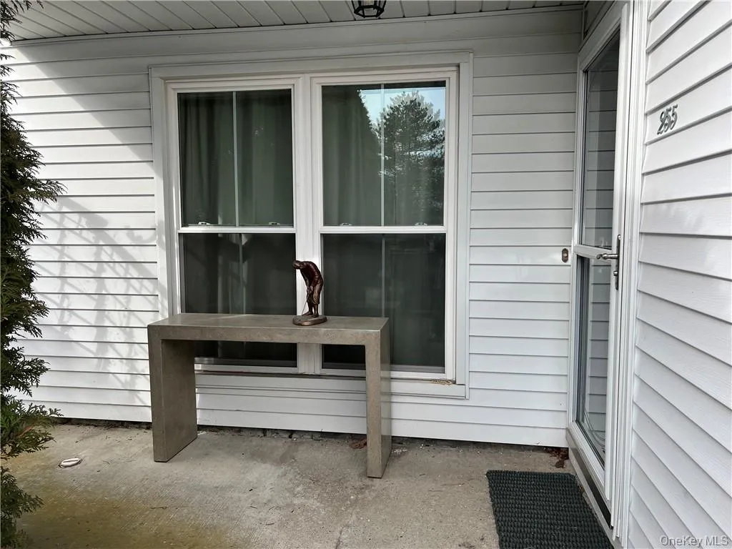 Your front entry way is a blank slate. Add a bench or plants as you like to make this home your own. Your front entry way is a blank slate. Add a bench or plants as you like to make this home your own.