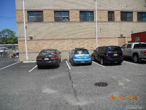 View of uncovered parking lot View of uncovered parking lot