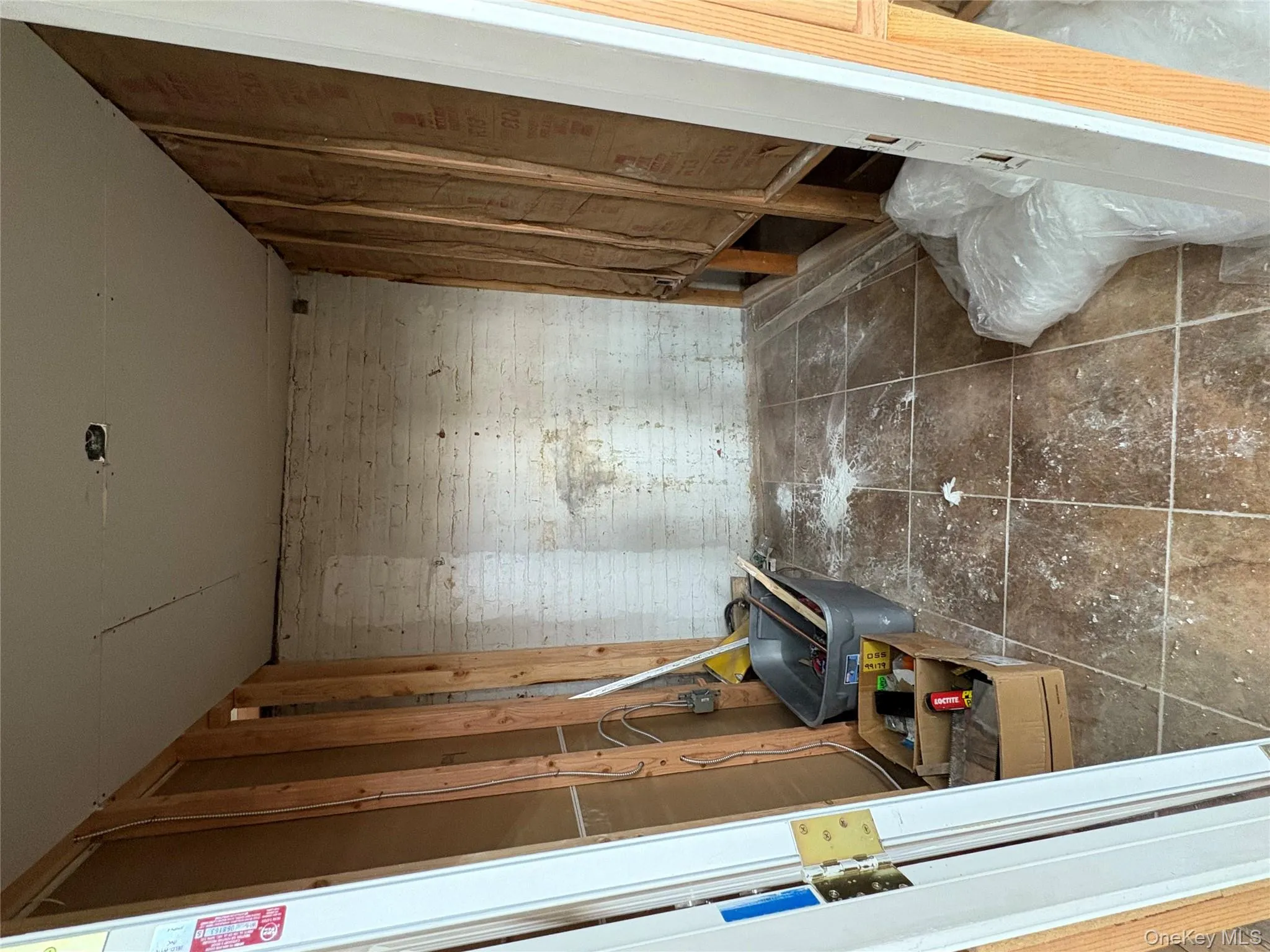 Bathroom featuring tile patterned floors Bathroom featuring tile patterned floors