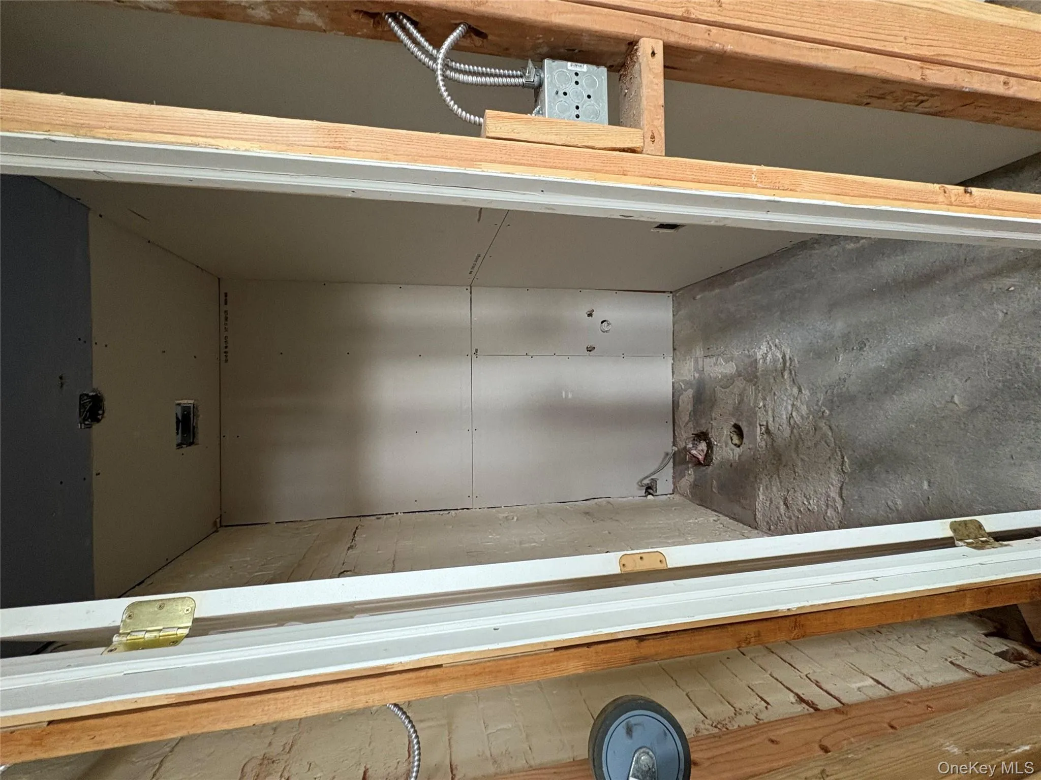 Bathroom featuring unfinished concrete floors Bathroom featuring unfinished concrete floors