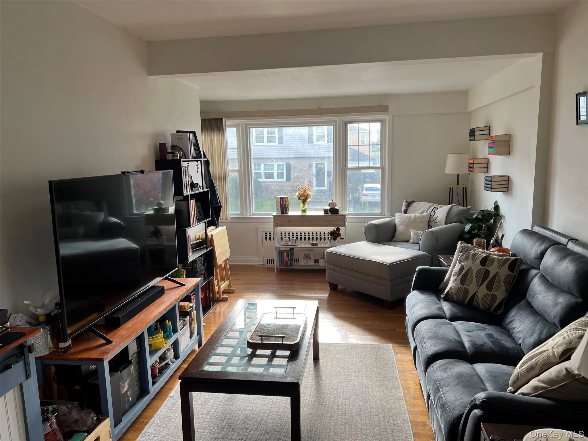 Living area featuring wood finished floors Living area featuring wood finished floors