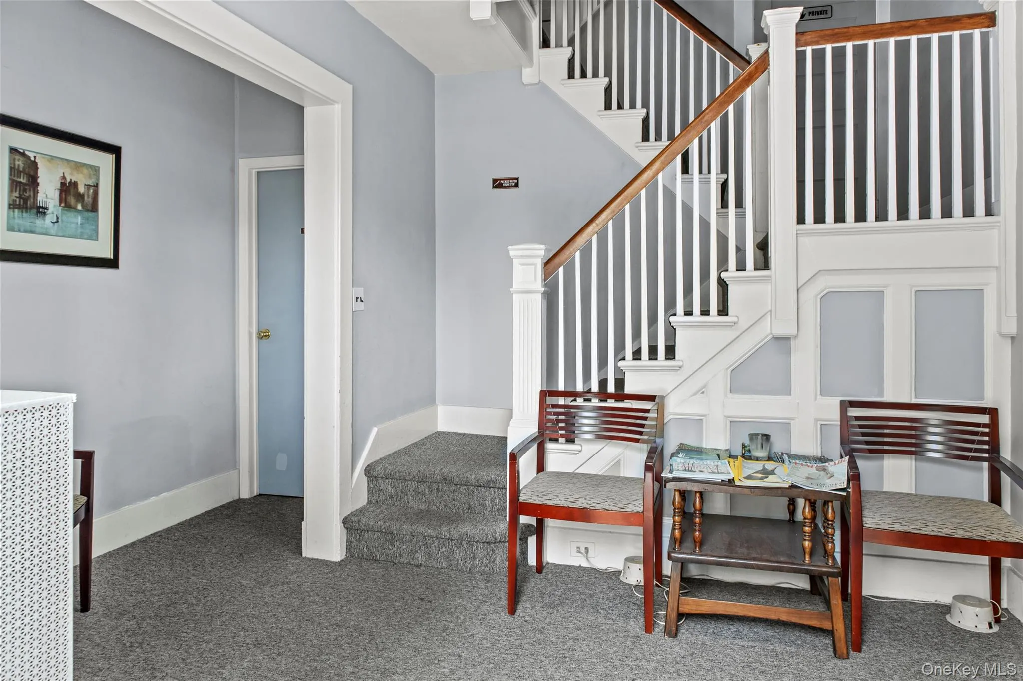 Stairway with carpet flooring and baseboards Stairway with carpet flooring and baseboards