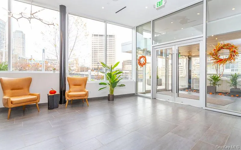 Building lobby featuring a city view Building lobby featuring a city view