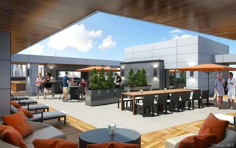 Building lobby featuring a high ceiling Building lobby featuring a high ceiling