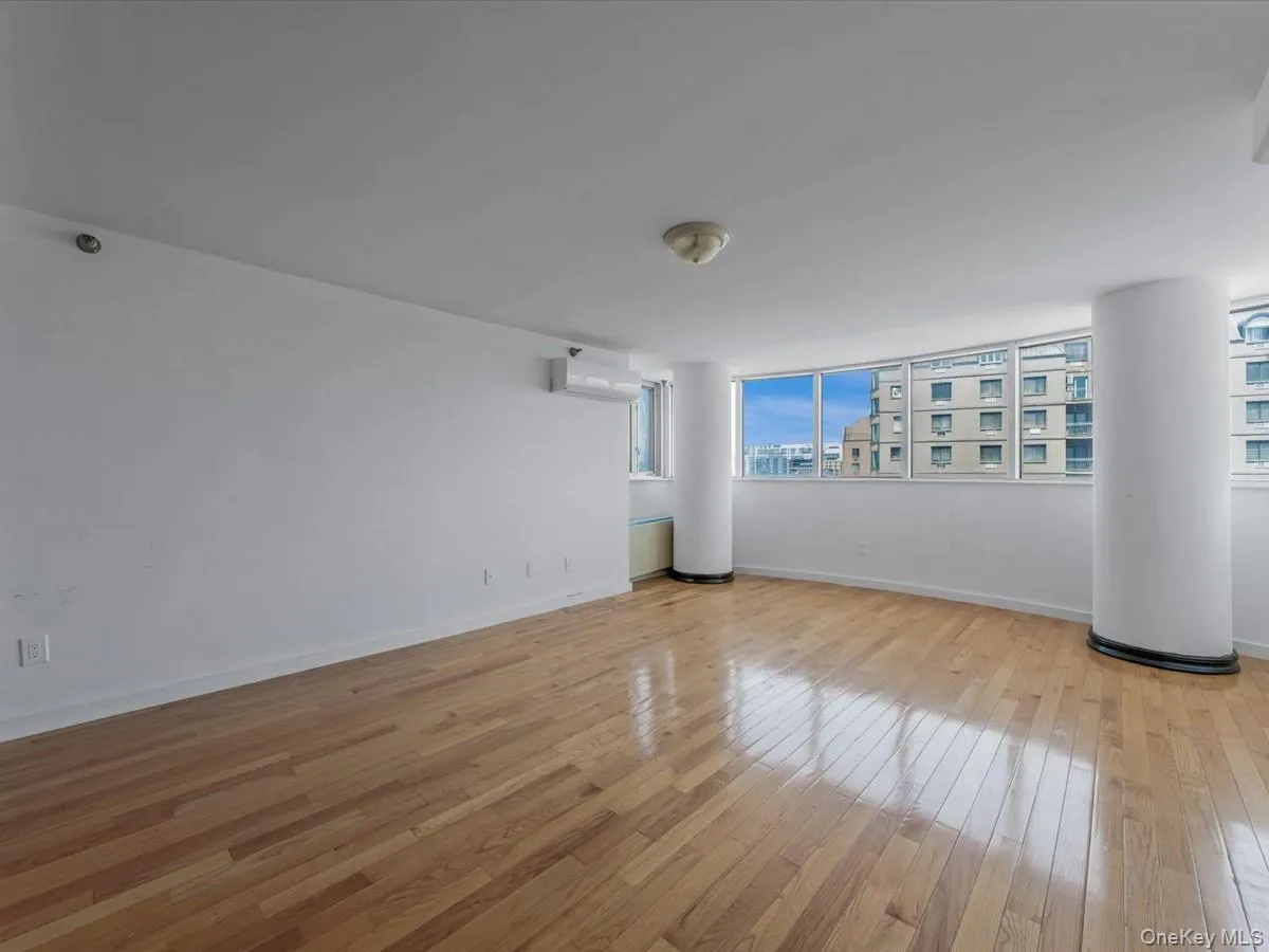 Spare room featuring light wood-style flooring and baseboards Spare room featuring light wood-style flooring and baseboards