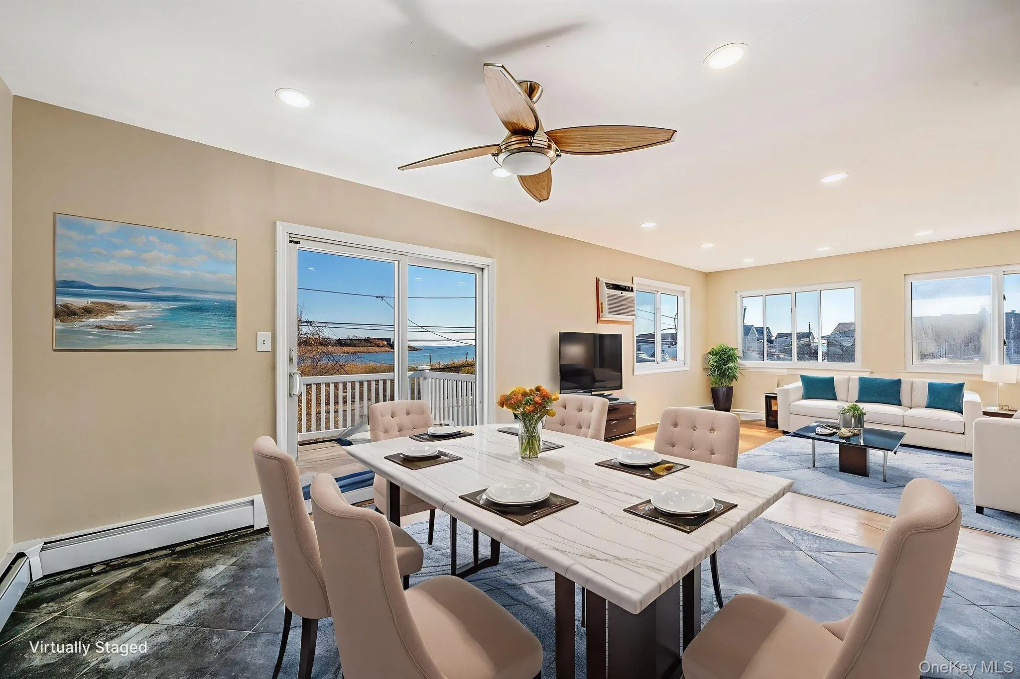 Dining area with ceiling fan, recessed lighting, and an AC wall unit Dining area with ceiling fan, recessed lighting, and an AC wall unit
