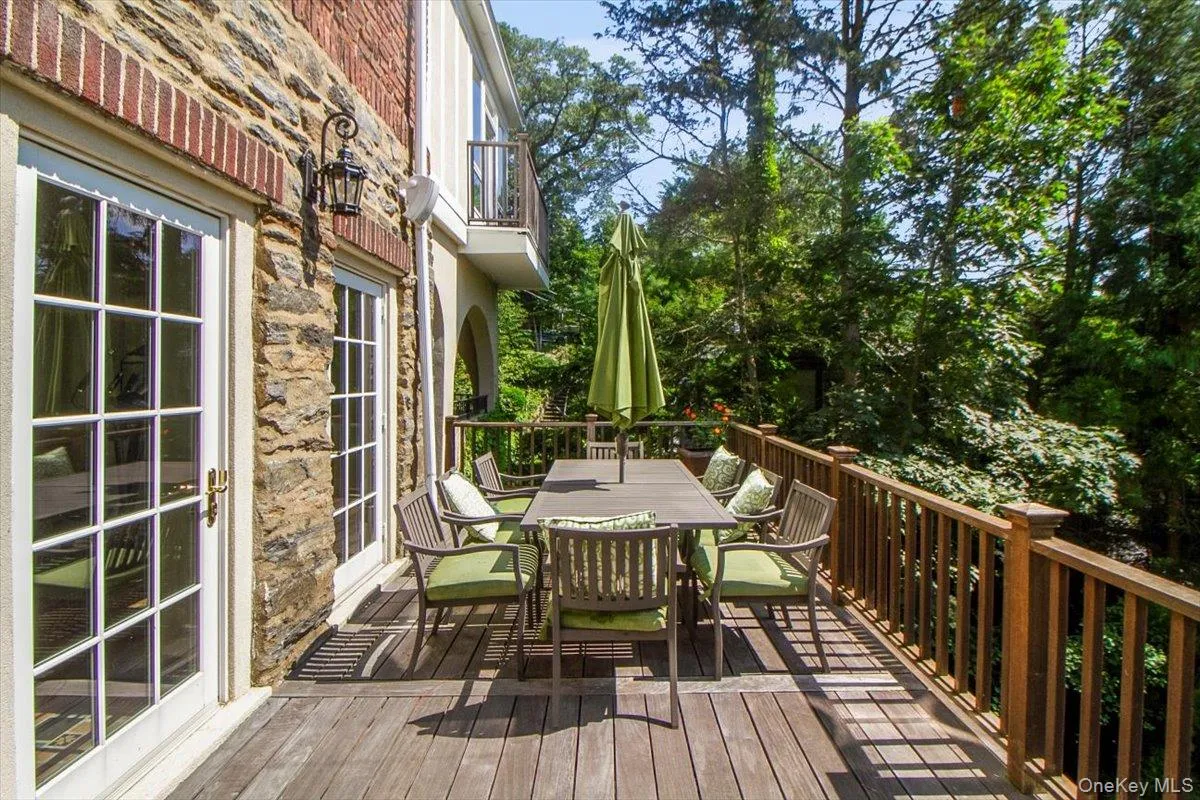 Wooden deck with outdoor dining space Wooden deck with outdoor dining space