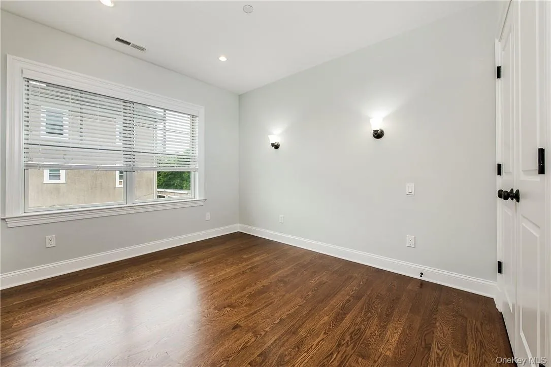 ONE OF TWO ADDITIONAL BEDROOMS WITH FITTED CLOSETS ONE OF TWO ADDITIONAL BEDROOMS WITH FITTED CLOSETS