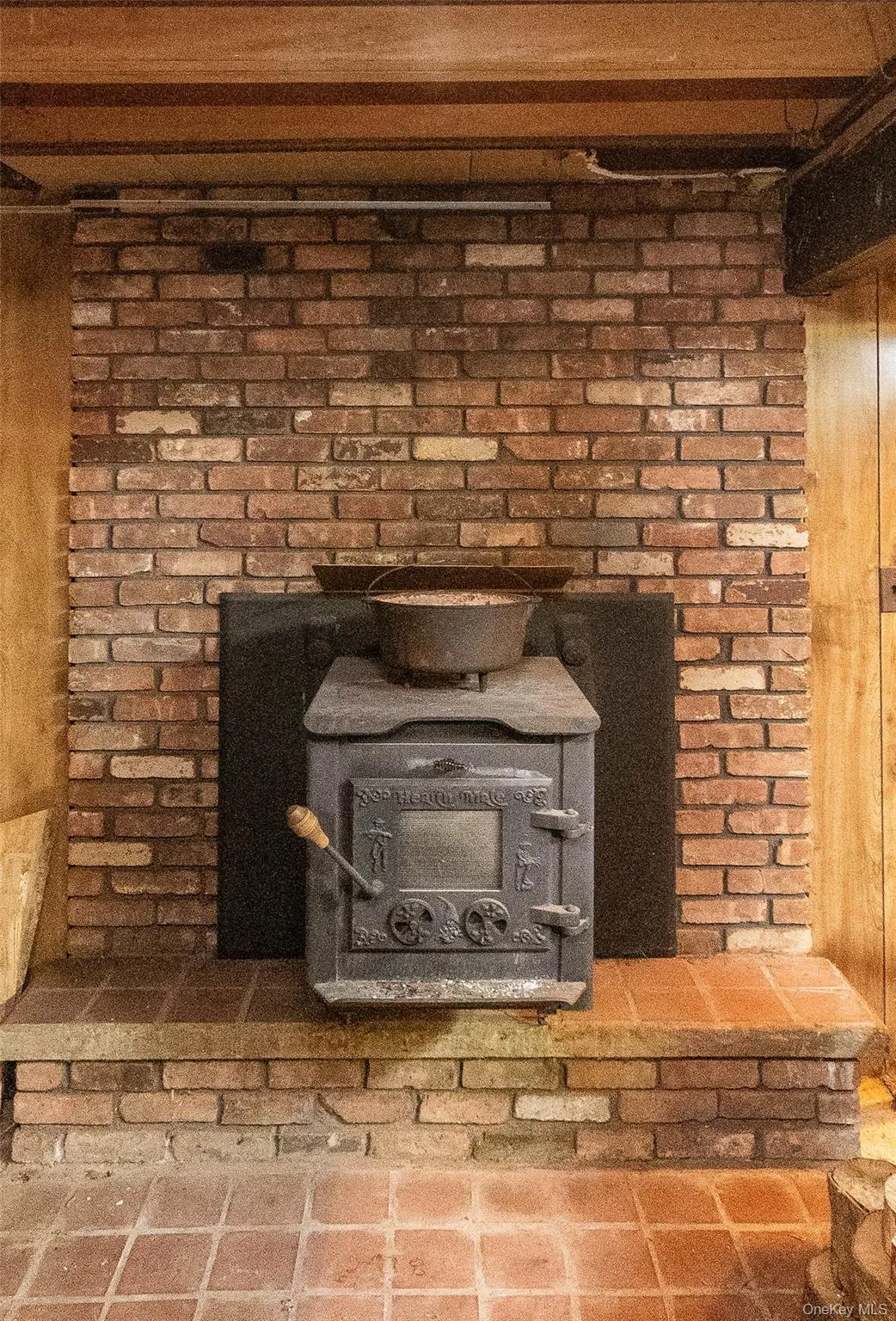 Woodburning Stove in Basement will heat home through vents in floor. Woodburning Stove in Basement will heat home through vents in floor.