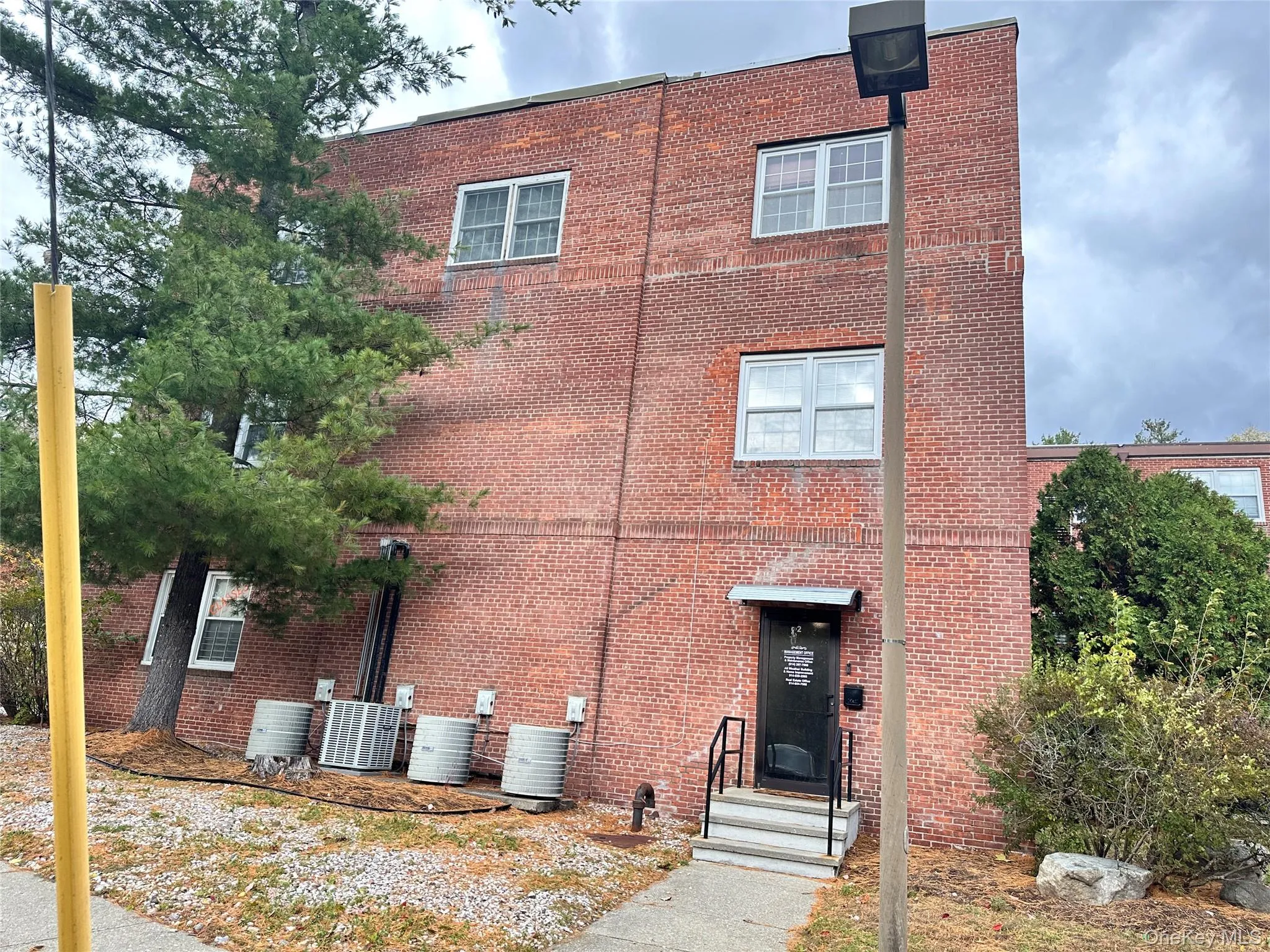 View of front facade featuring brick siding View of front facade featuring brick siding