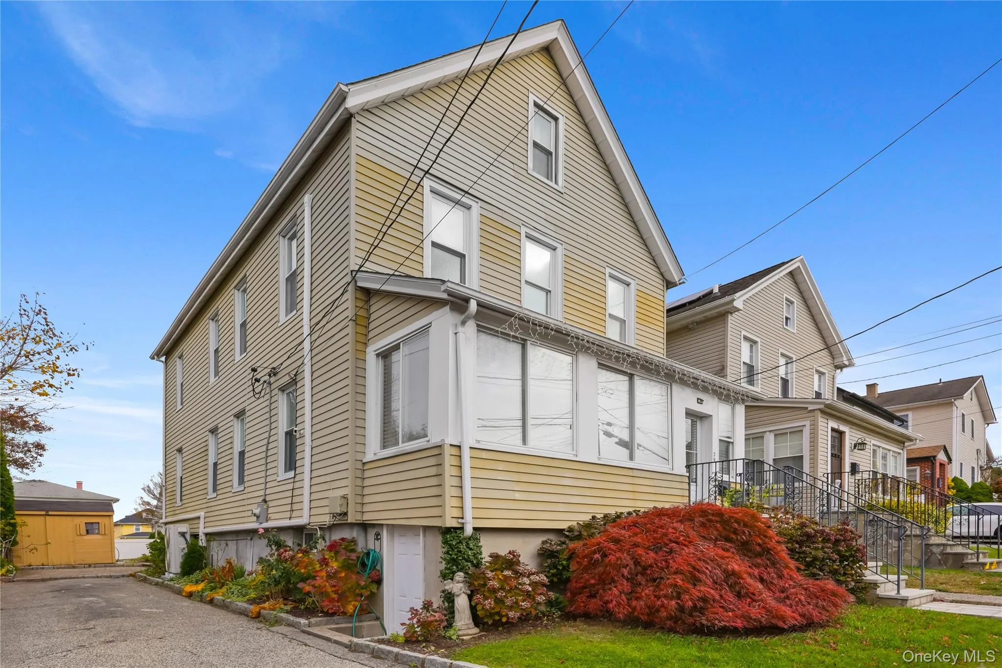 View of home's exterior featuring a residential view View of home's exterior featuring a residential view