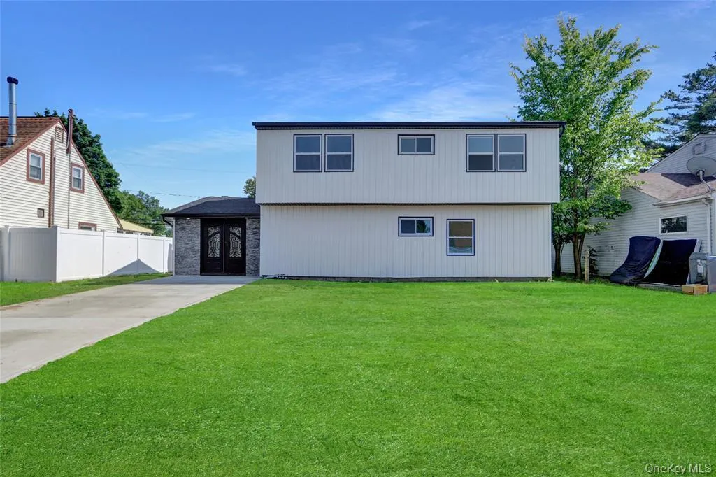 View of front of property with concrete driveway View of front of property with concrete driveway
