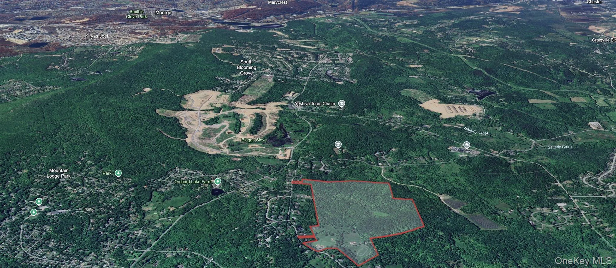 Aerial view of property's location featuring property boundaries highlighted Aerial view of property's location featuring property boundaries highlighted