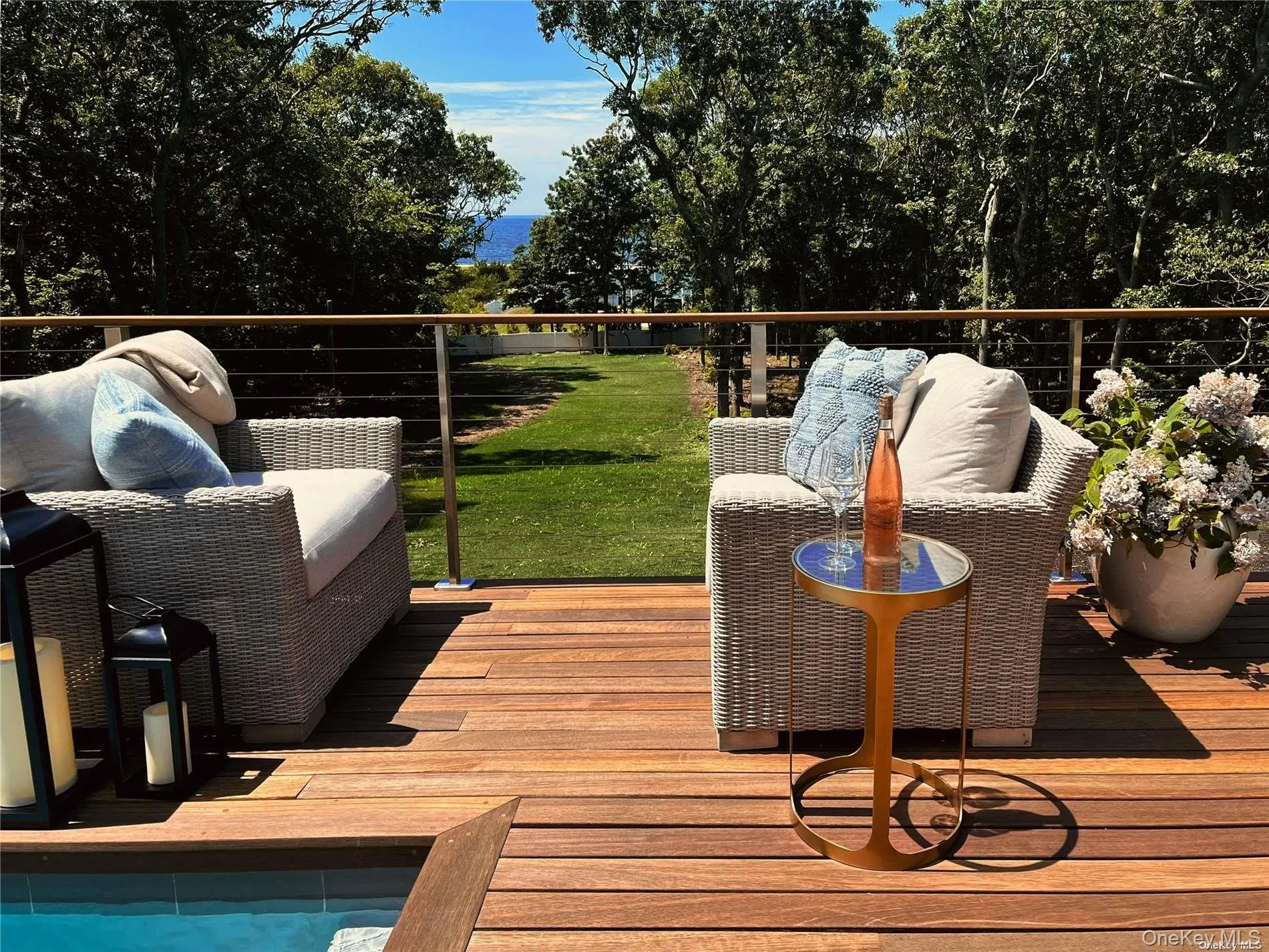 Pool deck with water views Pool deck with water views