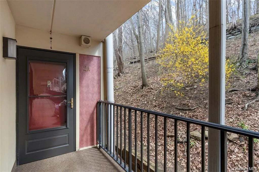 View of exterior entry featuring stucco siding View of exterior entry featuring stucco siding