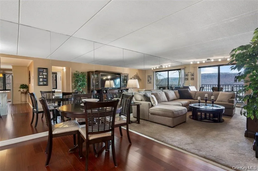 Dining area and living room. Dining area and living room.
