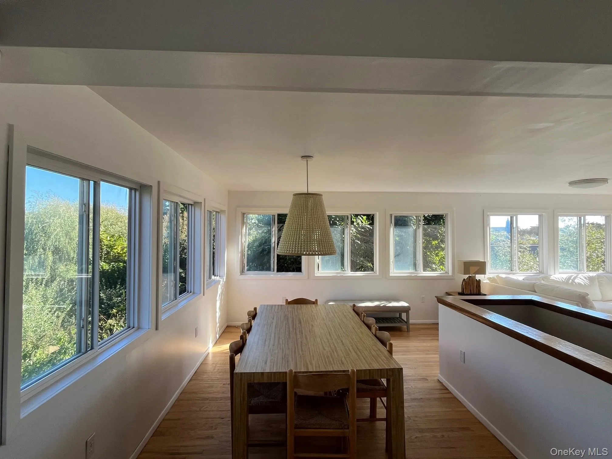 Dining room featuring wood finished floors and baseboards Dining room featuring wood finished floors and baseboards