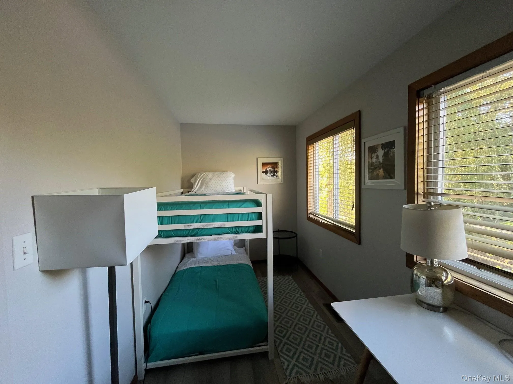 Bedroom featuring dark wood-type flooring Bedroom featuring dark wood-type flooring