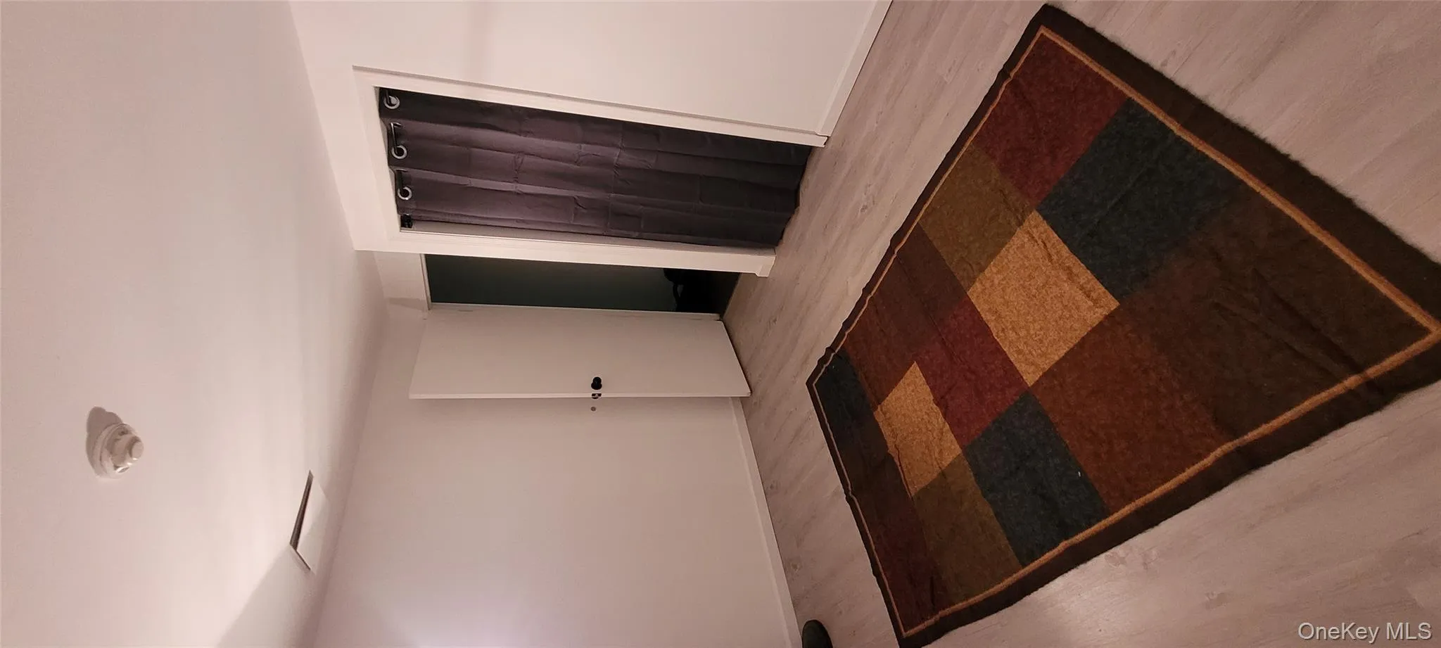 Empty room featuring wood finished floors Empty room featuring wood finished floors