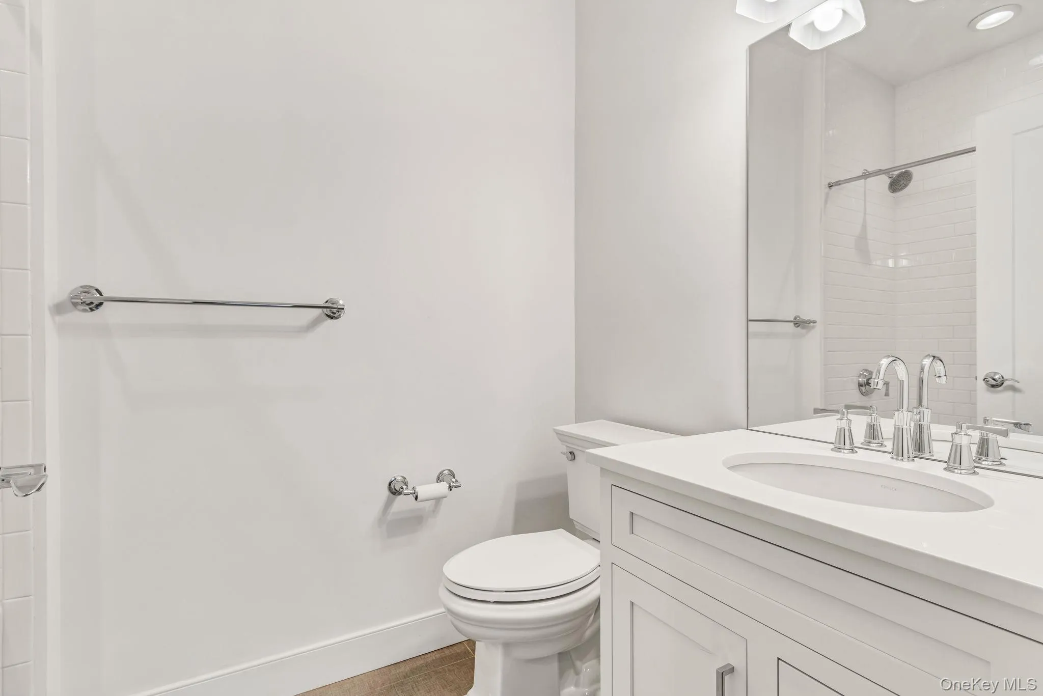 Bathroom with vanity and a shower Bathroom with vanity and a shower