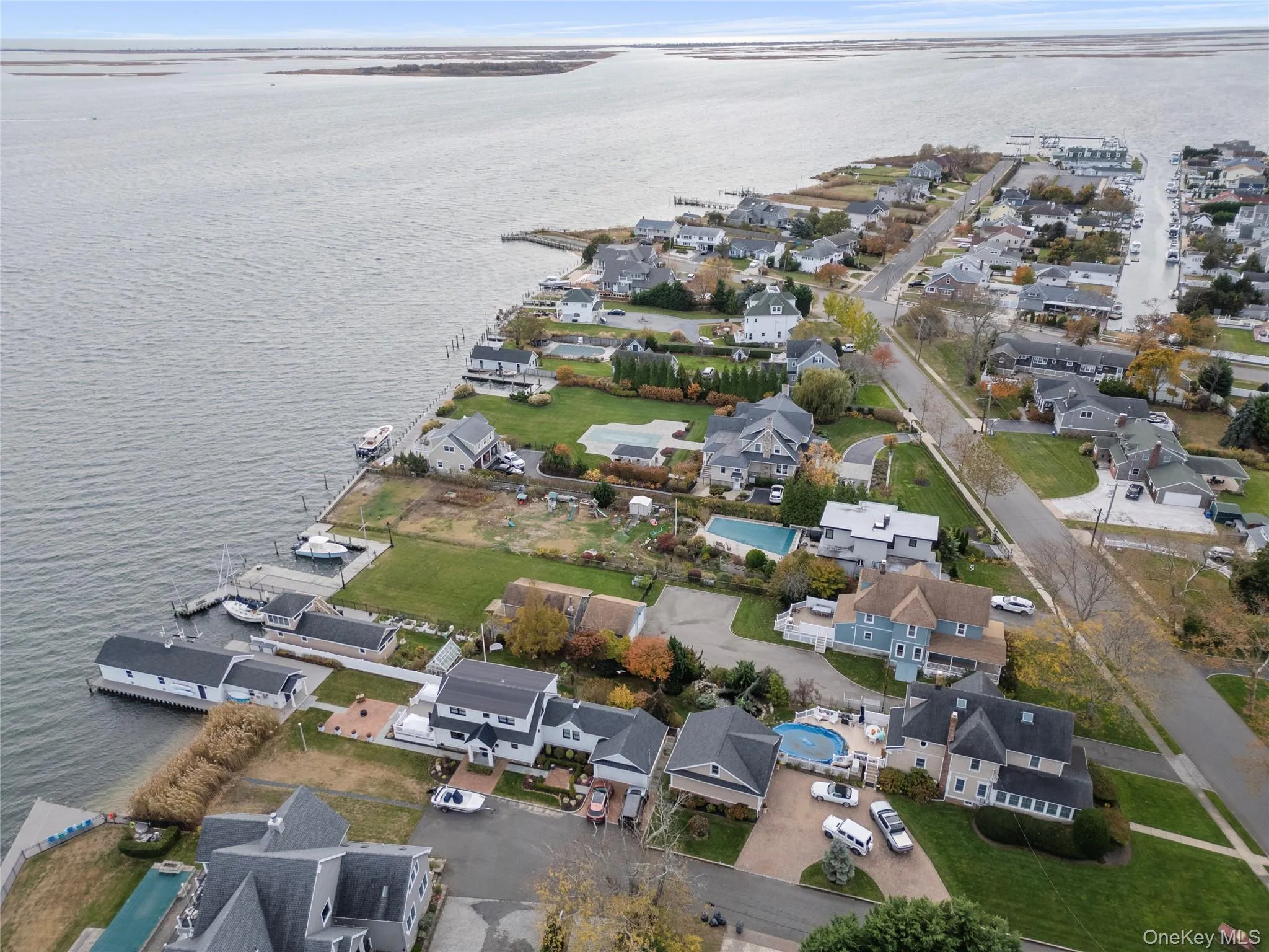 View of property location with nearby suburban area and a nearby body of water View of property location with nearby suburban area and a nearby body of water