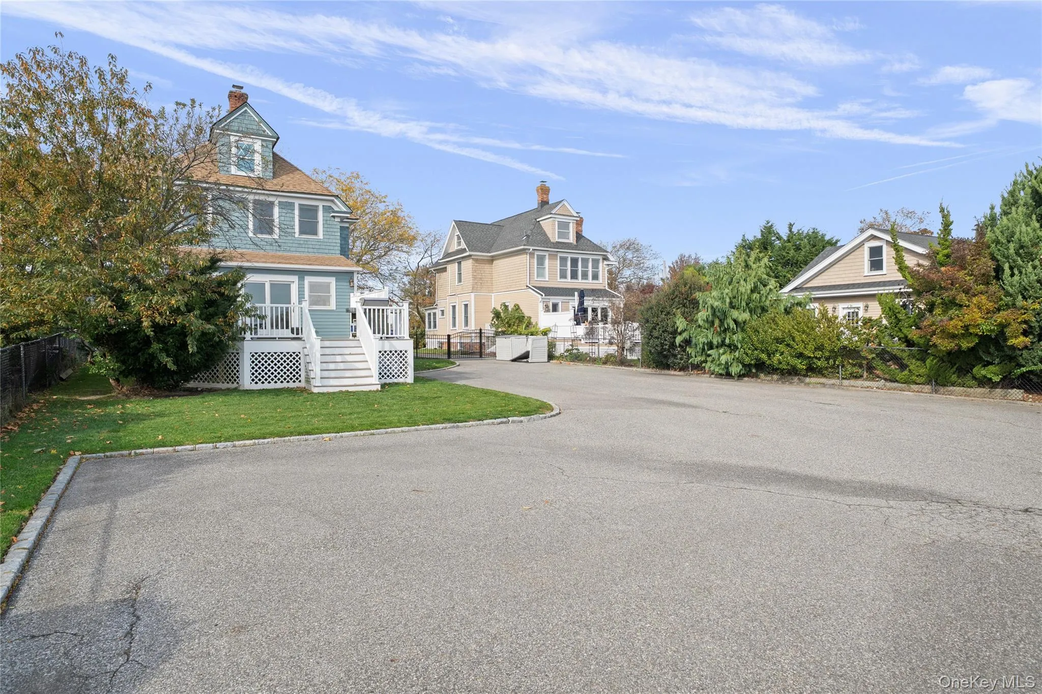 View of asphalt road featuring curbs and stairway View of asphalt road featuring curbs and stairway