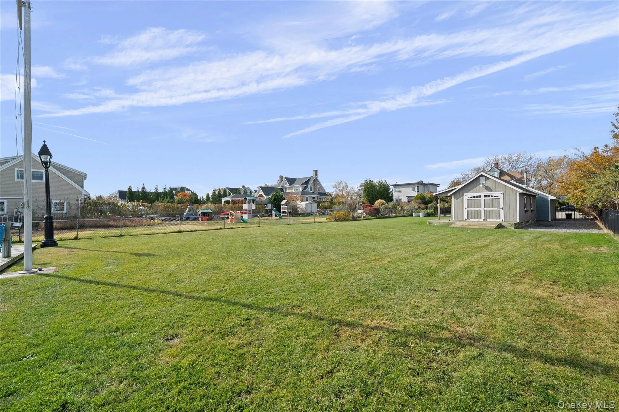 View of yard with an outdoor structure View of yard with an outdoor structure