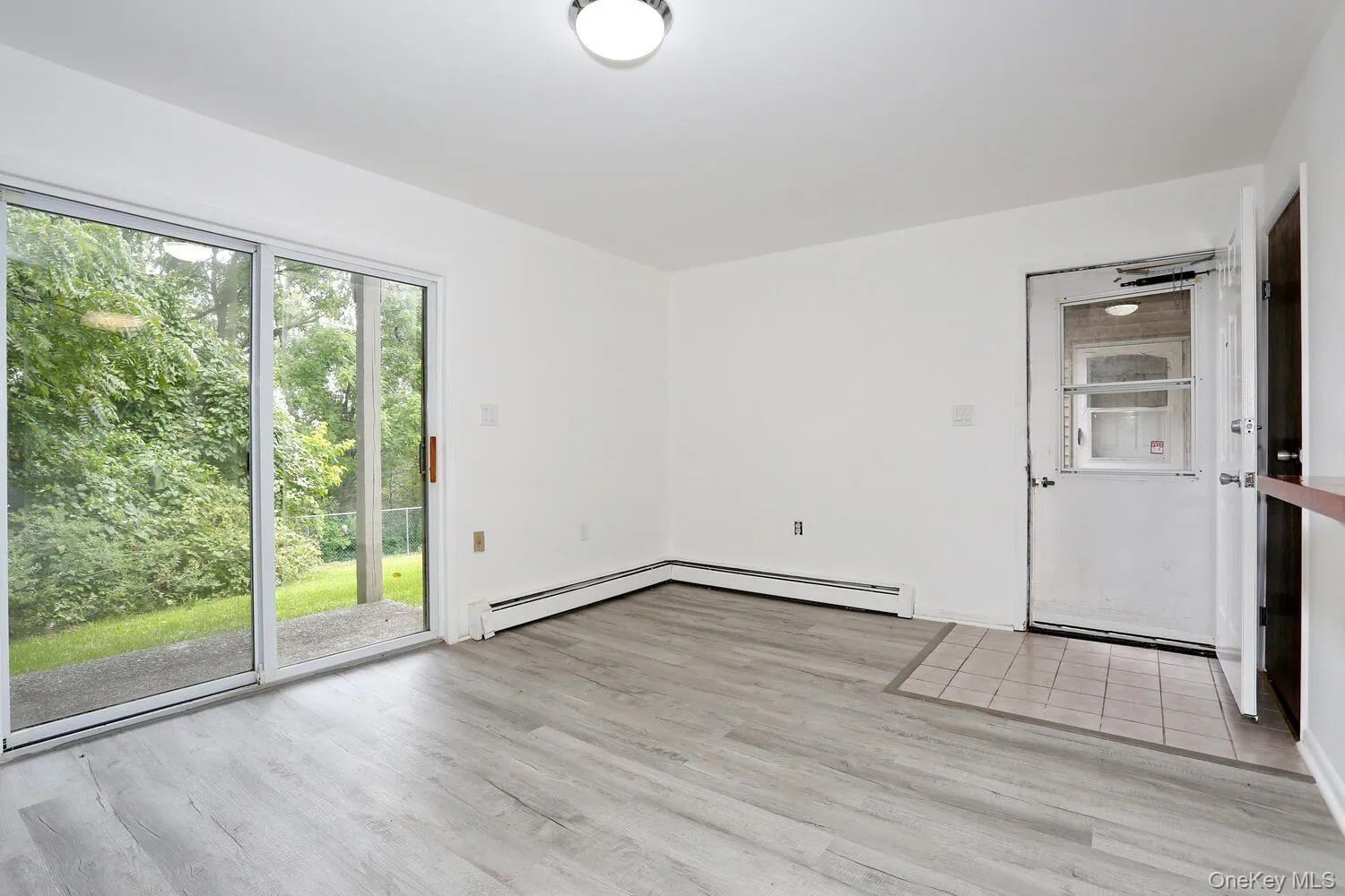 Empty room with light wood-type flooring Empty room with light wood-type flooring