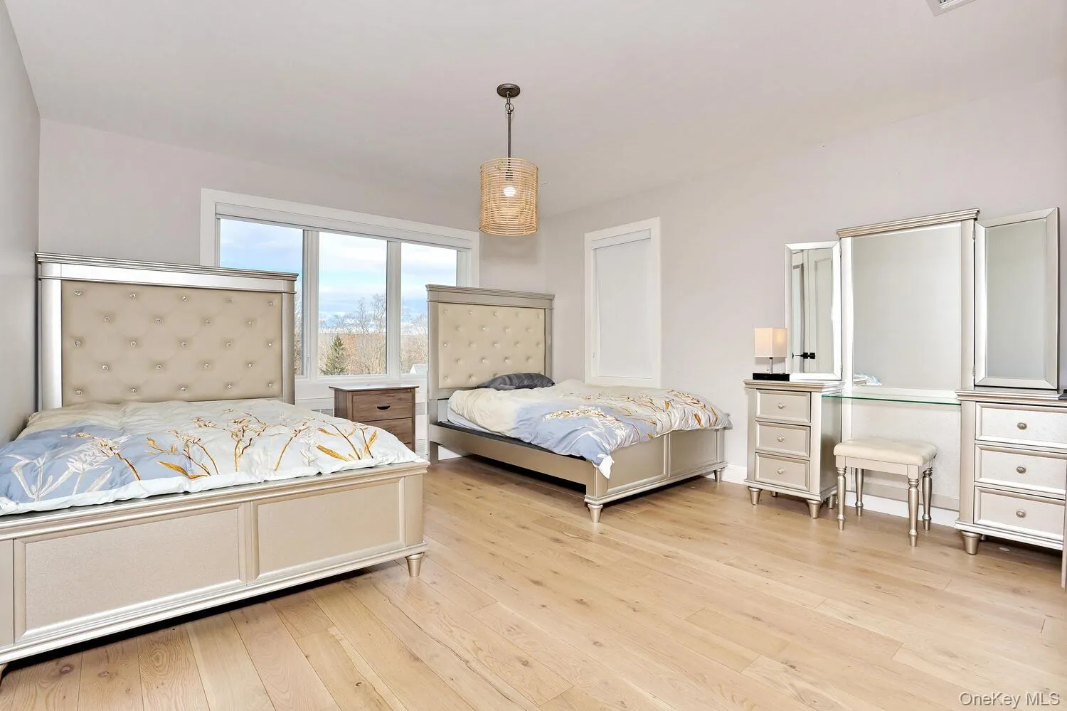 Bedroom with light wood finished floors Bedroom with light wood finished floors