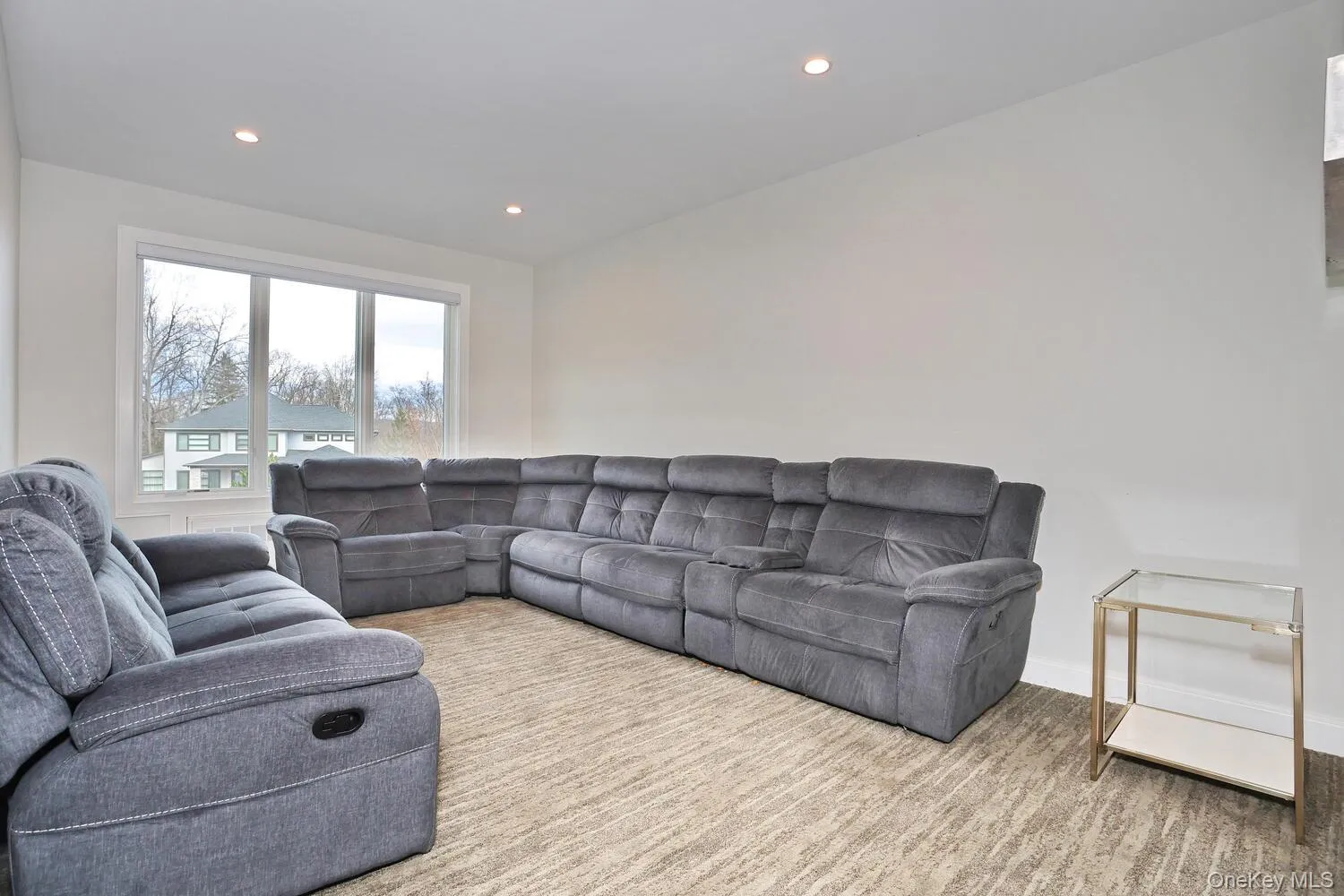 Living room featuring recessed lighting Living room featuring recessed lighting