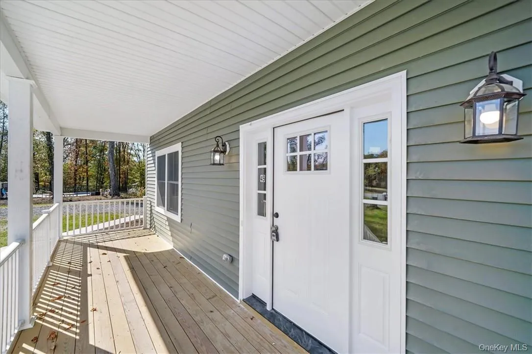 Deck featuring a porch Deck featuring a porch