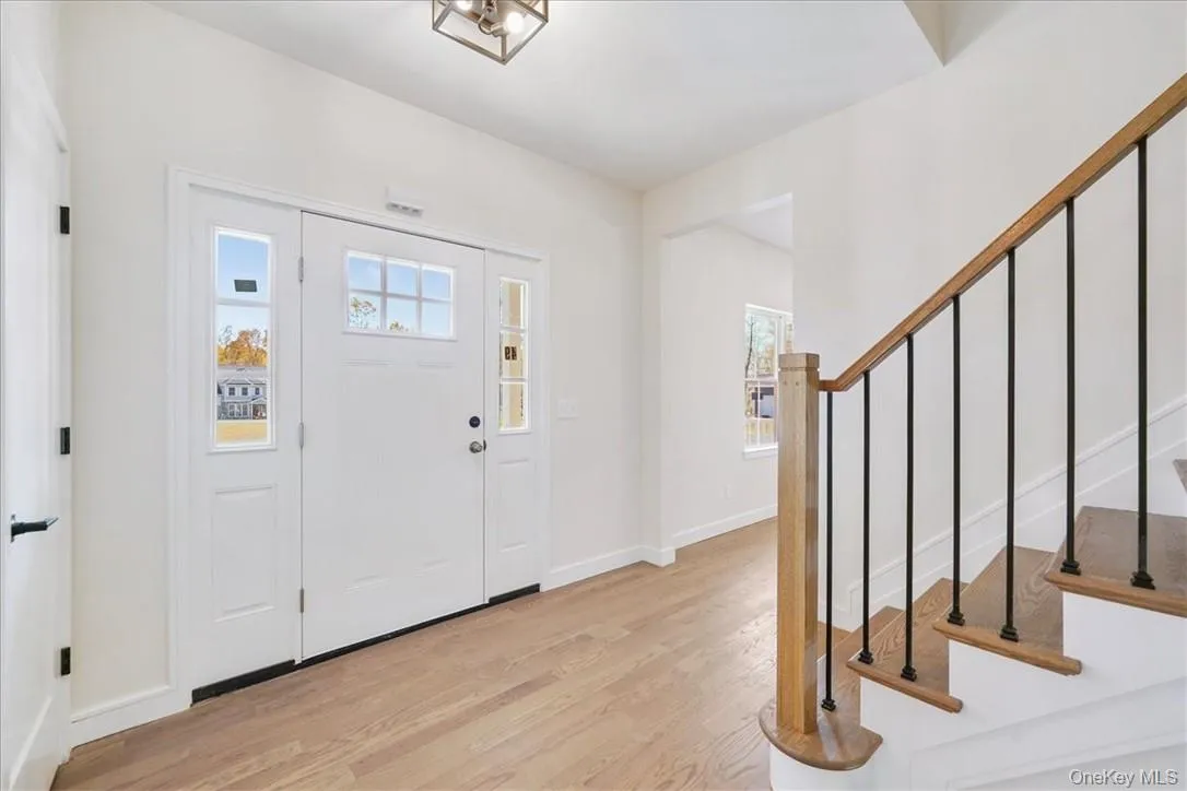Entryway featuring light wood-type flooring Entryway featuring light wood-type flooring