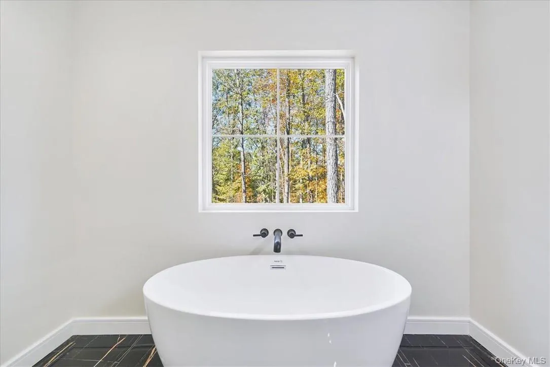 Bathroom with a washtub Bathroom with a washtub