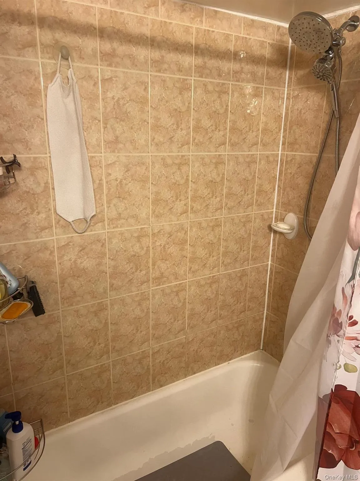 Bathroom with shower / tub combo Bathroom with shower / tub combo