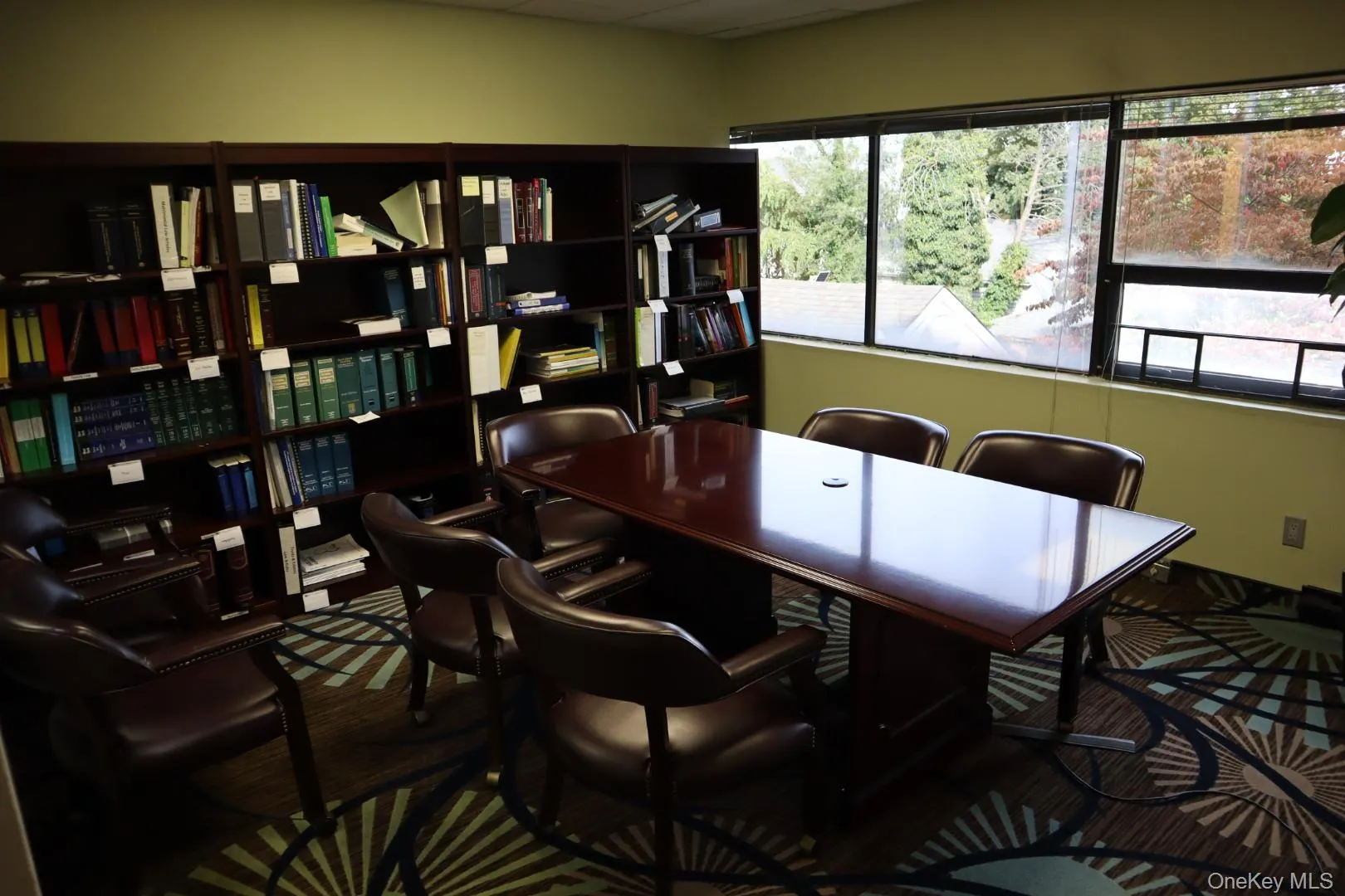 Conference room with a paneled ceiling Conference room with a paneled ceiling