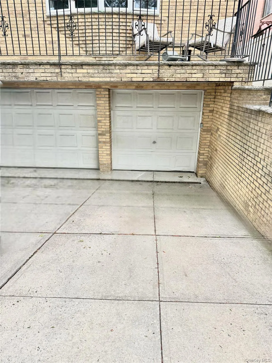 Garage with concrete driveway Garage with concrete driveway